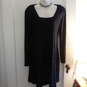 Gently worn navy blue long sleeve square neck sparkly dress. Size 8.